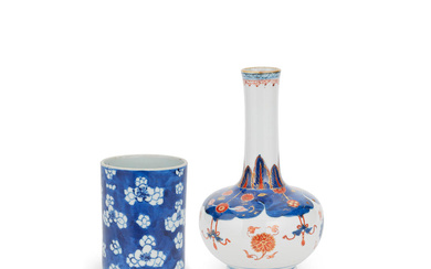 A BLUE AND WHITE BRUSHPOT AND A COPPER-RED DECORATED BOTTLE...