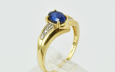A BLUE SAPPHIRE AND DIAMOND RING