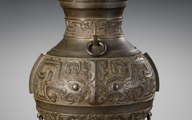 A BRONZE ARCHAISTIC ‘TAOTIE’ VASE, HU, EARLY QING DYNASTY