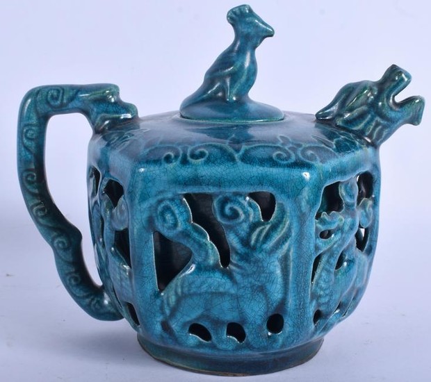 A CHINESE BLUE GLAZED RETICULATED PORCELAIN TEA POT. 16
