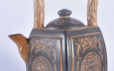 A CHINESE BROWN GLAZED POTTERY TEAPOT AND COVER painted with flowers and motifs. 19 cm x 12 cm.
