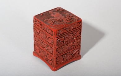 A CHINESE CINNABAR LACQUER THREE-TIERED BOX AND COVER. Ming Dynasty, 15th Century. Of square section with chamfered corners, the cover carved with a solitary figure wrapped in long flowing windswept robes, among long grasses also bent in the wind and...