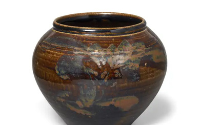 A Chinese Henan russet-painted black-glazed jar Song dynasty The wide mouthed, tapering...