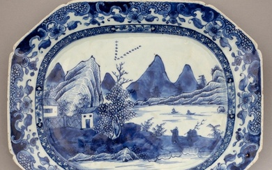 A Chinese blue and white dish, early 19th c, sketchily paint...