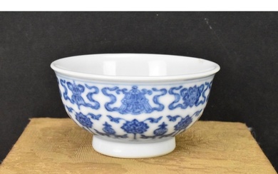 A Chinese blue and white tea bowl, decorated with lotus flow...