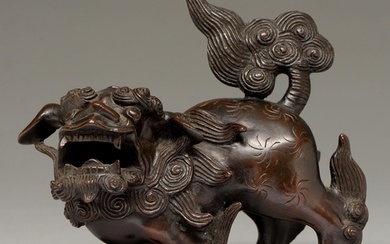 A Chinese bronze sculpture of a dog of Fo, 19th c, 17cm h...
