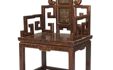 A Chinese hardwood armchair, Qing dynasty, Qianlong period, with carved panels to back and shaped frame, gilt painted with insects and floral sprays throughout, shaped arm supports, raised on square supports united by square stretchers, 98cm high...