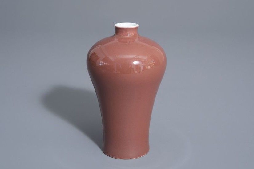 A Chinese monochrome red meiping vase, 19th/20th C....