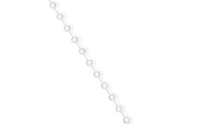 A DIAMOND BRACELET The cable-link chain interspersed with c...