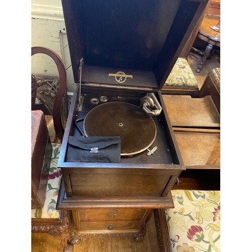 A Decca gramophone, in tall leather case, 29 cm wide, a Colu...