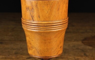A Fine 19th Century Turned Lignum Vitae Goblet. The deep bucket-form bowl encompassed by a decorativ