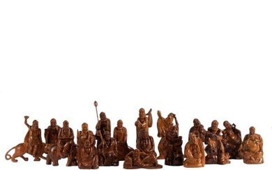A GROUP OF CARVED HUANGHUALI EIGTEEN LUOHAN BUDDHAS