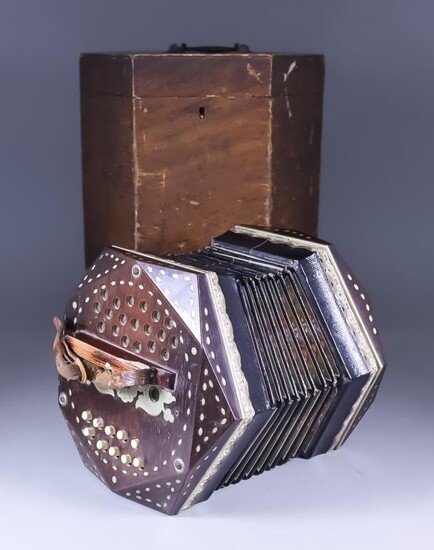 A German Concertina, Late 19th Century, with rosewood ends,...