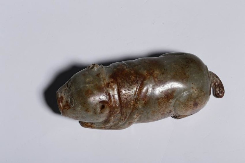 A HETIAN JADE CARVED PIG ORNAMENT