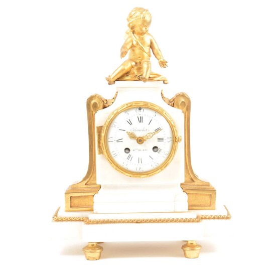 A Louis XVI ormolu and white marble mantel clock
