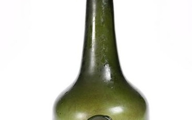 AN OLIVE GREEN GLASS WINE BOTTLE