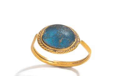 A Merovingian Gold and Blue Glass Finger Ring