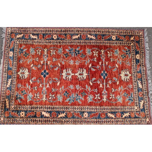 A Middle Eastern rug, worked in the traditional manner, 152c...