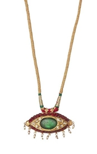 A Mughal inscribed cabochon emerald set gold...