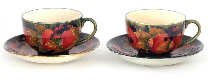 A PAIR OF EARLY MOORCROFT BURSLEM CABINET CUPS AND