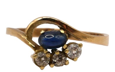 A POLISH 14CT GOLD, SAPPHIRE AND DIAMOND STYLISED CROSSOVER...