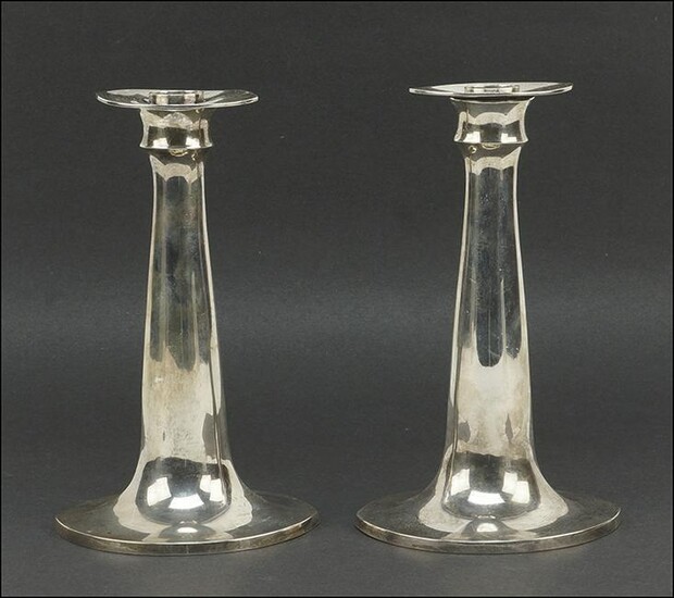 A Pair of Towle Sterling Silver Candlesticks.