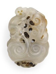A RETICULATED AGATE PENDANT QING DYNASTY, 19TH CENTURY