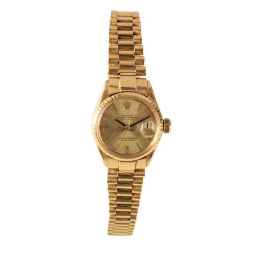 A ROLEX OYSTER PERPETUAL DATEJUST 18CT GOLD LADY'S BRACELET ...