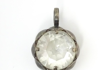 A Scandinavian silver pendant set with facet cut white stone...