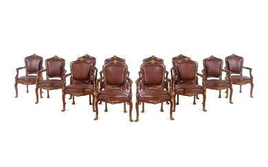 A Set of Fourteen Louis XV Style Gilt Bronze Mounted Walnut Dining Chairs