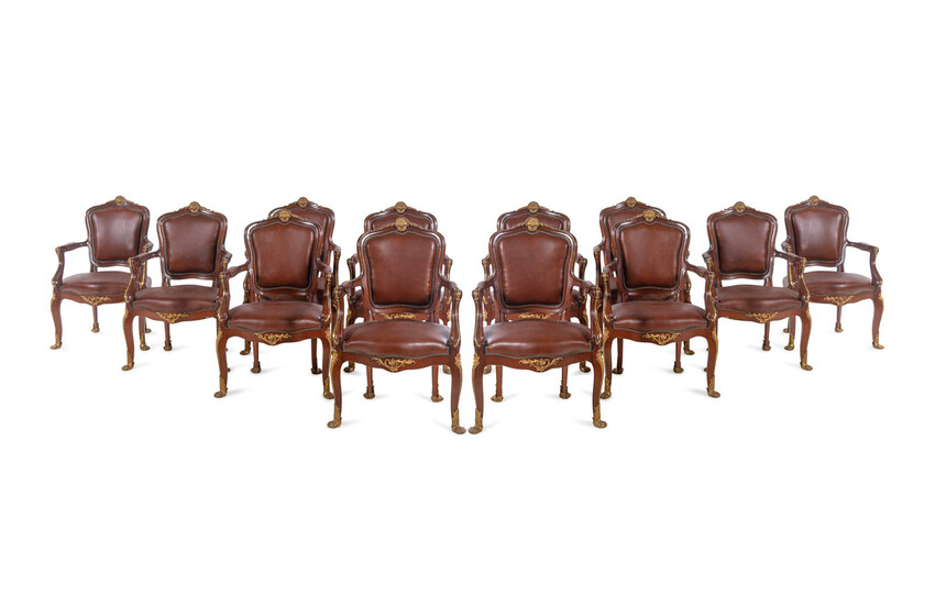 A Set of Fourteen Louis XV Style Gilt Bronze Mounted Walnut Dining Chairs