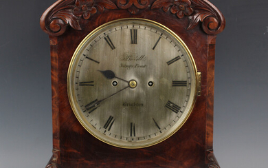 A Victorian figured mahogany bracket clock with eight day twin fusee movement striking on a gong, th