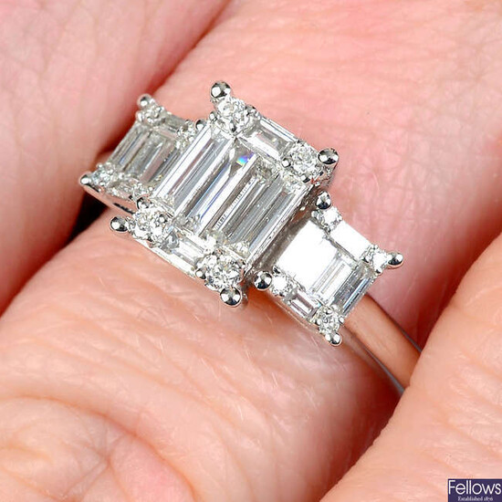 A baguette and brilliant-cut diamond graduated triple cluster ring.