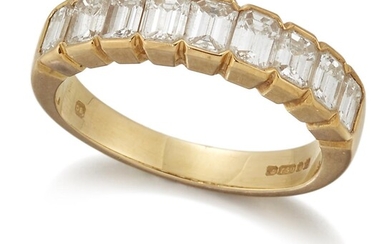 A baguette diamond half eternity ring, composed of a line of nine baguette-cut diamonds, ring size J