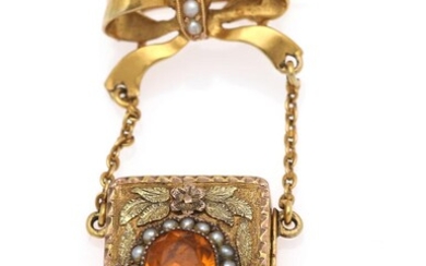 SOLD. A brooch set with an oval-cut topaz encircled by numerous seed pearls, mounted in 14k gold. L. 4 cm. – Bruun Rasmussen Auctioneers of Fine Art