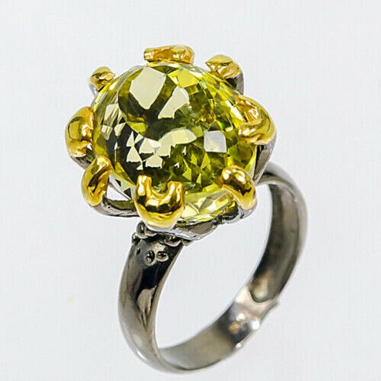 NOT SOLD. A citrine ring set with an oval-cut citrine, mounted in black rhodium, and gold plated sterling silver. Size 57. – Bruun Rasmussen Auctioneers of Fine Art