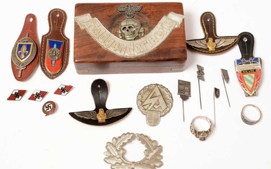 A collection of WWII and later German badges and buttons