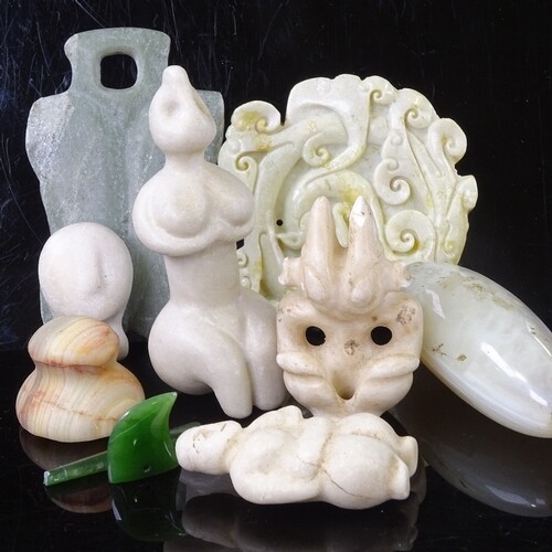 A collection of stone carvings, including Chinese jade, Sout...