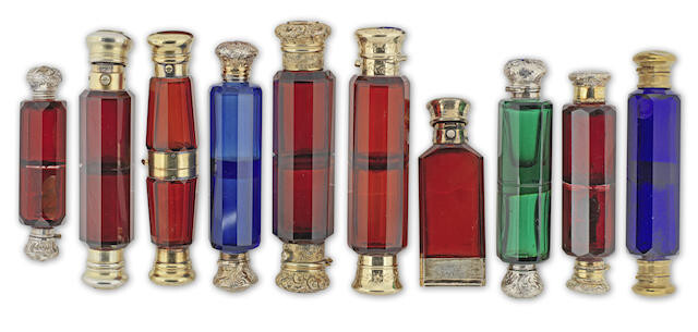 A collection of ten silver-mounted glass scent bottles