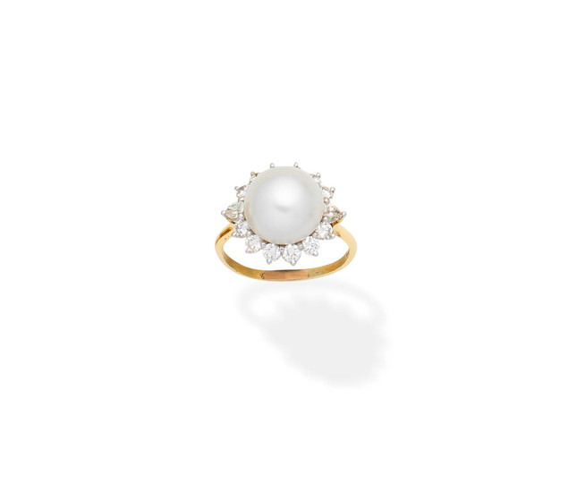 A cultured pearl and diamond cluster ring