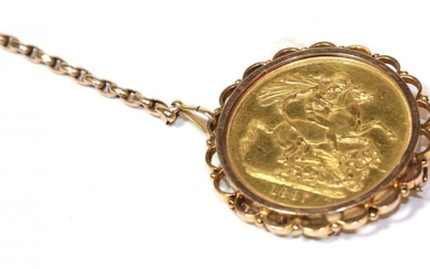 A double sovereign mounted as a brooch, dated 1887, diameter...
