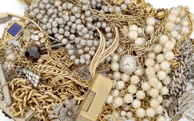 A group of costume jewellery including: a pair of cut steel and cultured pearl fan-shaped ear clips; a cased Swarovski crystal brooch and ring; a silver chain link bracelet; a gilt metal and paste leaf-design brooch with pendant fitting; a German...
