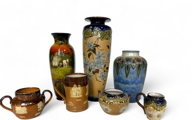 A group of variously decorated Royal Doulton pottery ...