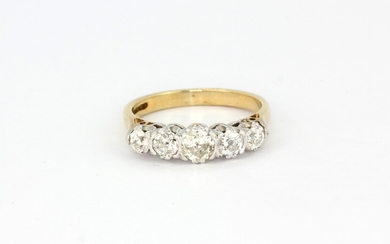 A hallmarked 9ct yellow gold ring set with five graduated brilliant cut diamonds, approx. 0.75ct total, (N).
