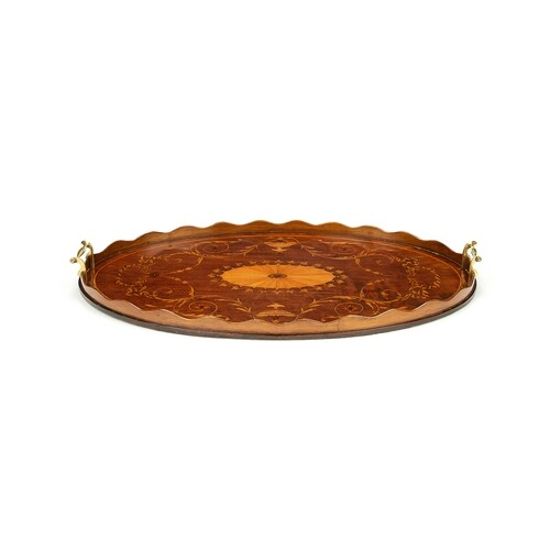 A late 19th mahogany and marquetry oval tray in the George I...