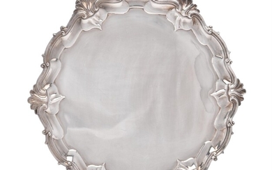 A late Victorian silver shaped circular salver by Edward Barnard & Sons Ltd.