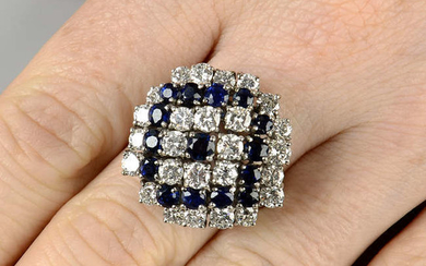 A mid 20th century sapphire and brilliant-cut diamond stepped bombe dress ring.