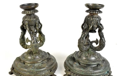 A pair of 19th century bronze Renaissance style candlesticks...