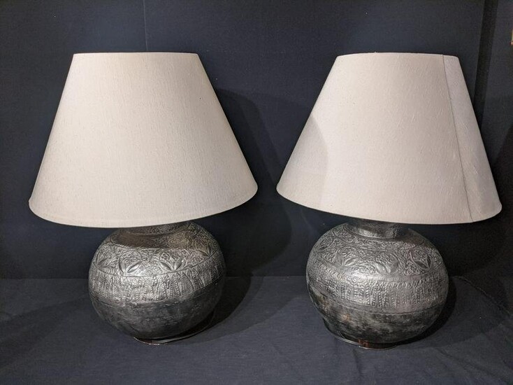 A pair of Eastern spherical silver colour table lamps