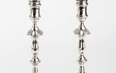 A pair of English sterling silver candlesticks - London...